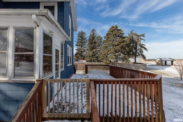 view of snow covered deck