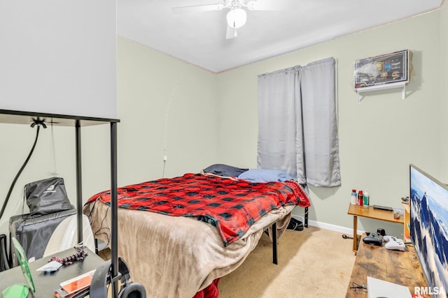 bedroom featuring light colored carpet and ceiling fan