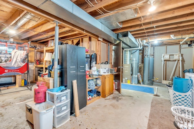 basement with heating unit and water heater