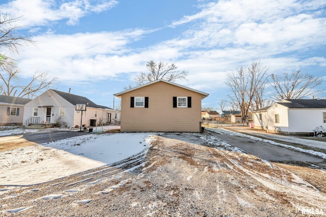 view of snow covered house