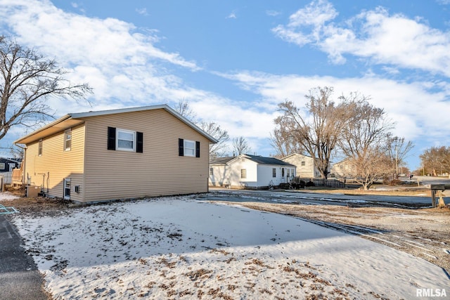 view of snow covered house