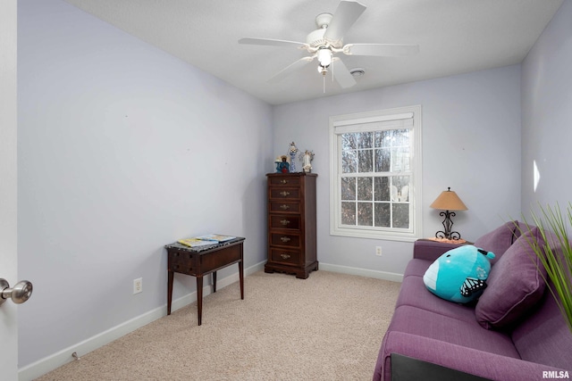 sitting room with light carpet and ceiling fan