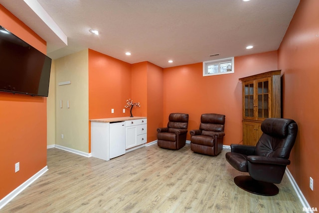 living area featuring light hardwood / wood-style flooring