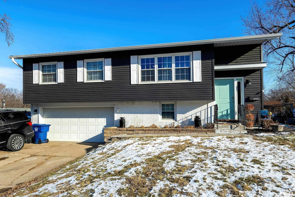 raised ranch with a garage