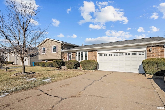 tri-level home featuring a garage