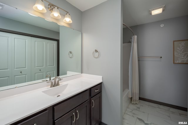 bathroom featuring vanity and shower / bathtub combination with curtain