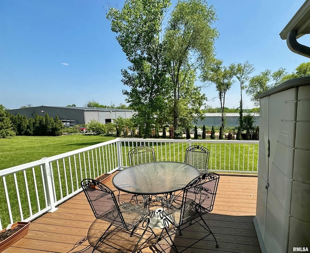 deck featuring a lawn