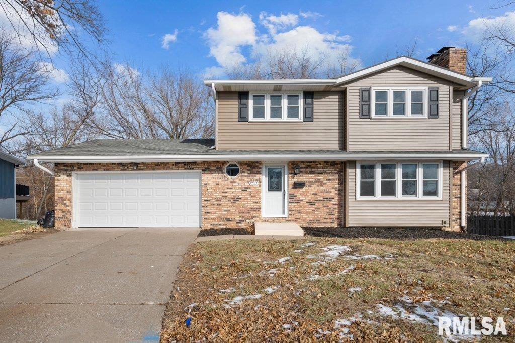 view of property featuring a garage