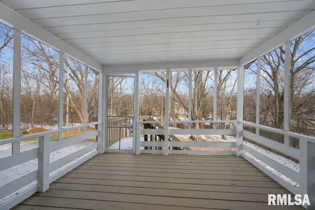 unfurnished sunroom with a wealth of natural light