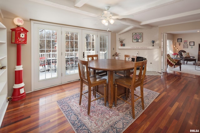 dining area with lofted ceiling with beams, ceiling fan, french doors, and a healthy amount of sunlight