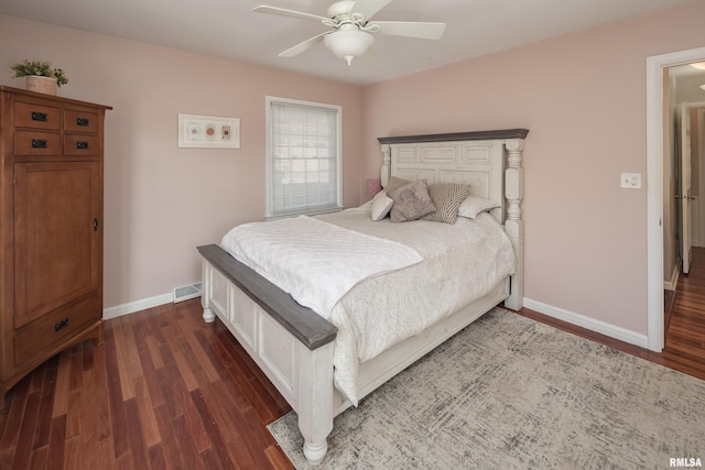 bedroom featuring ceiling fan and dark wood-type flooring