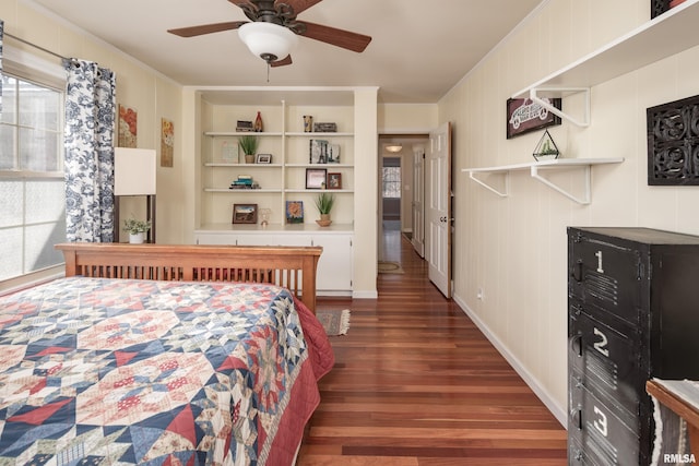 bedroom featuring ceiling fan and dark hardwood / wood-style floors