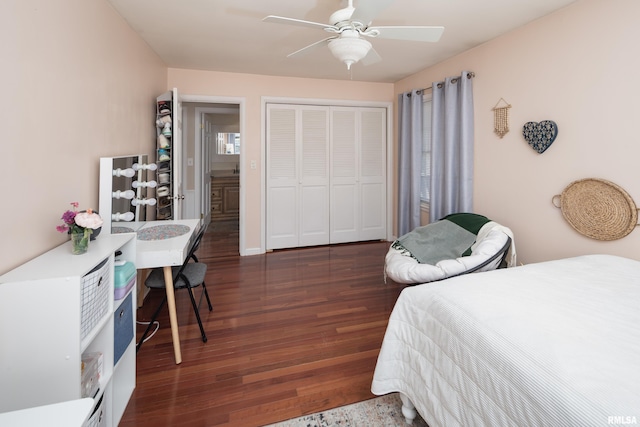 bedroom with ceiling fan, a closet, and dark hardwood / wood-style floors