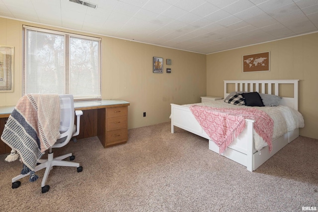 bedroom featuring light colored carpet