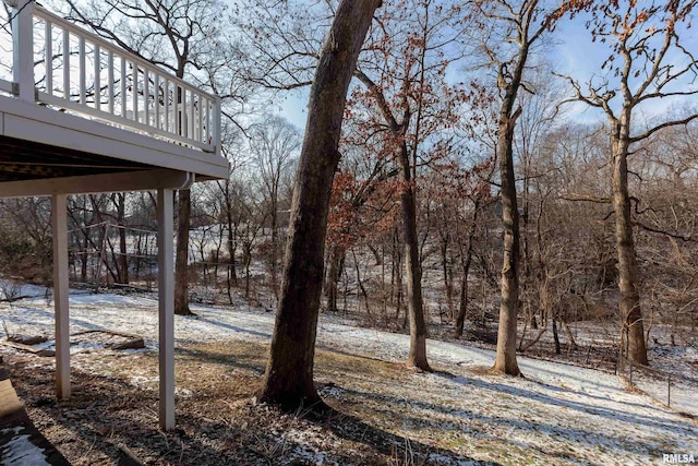 view of yard with a wooden deck