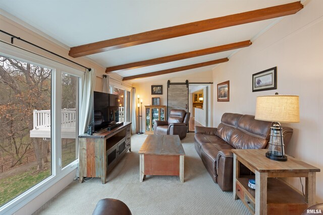 living room featuring light carpet, vaulted ceiling with beams, and a barn door