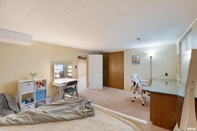 bedroom with carpet flooring and visible vents