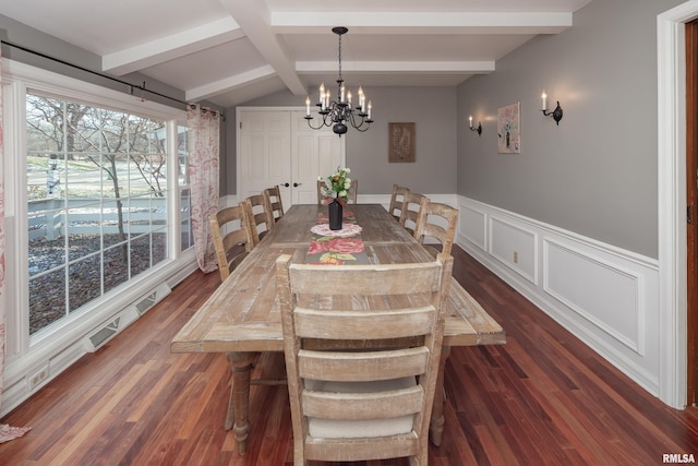 dining room featuring dark hardwood / wood-style flooring, beamed ceiling, and a notable chandelier