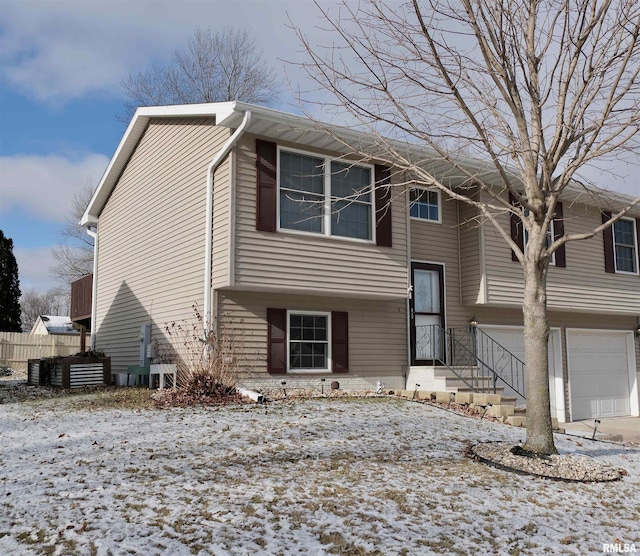 view of front of home with a garage