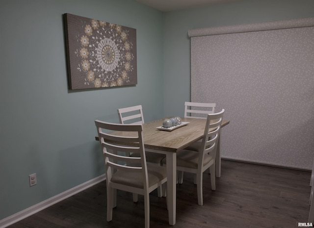 dining room featuring dark wood-type flooring