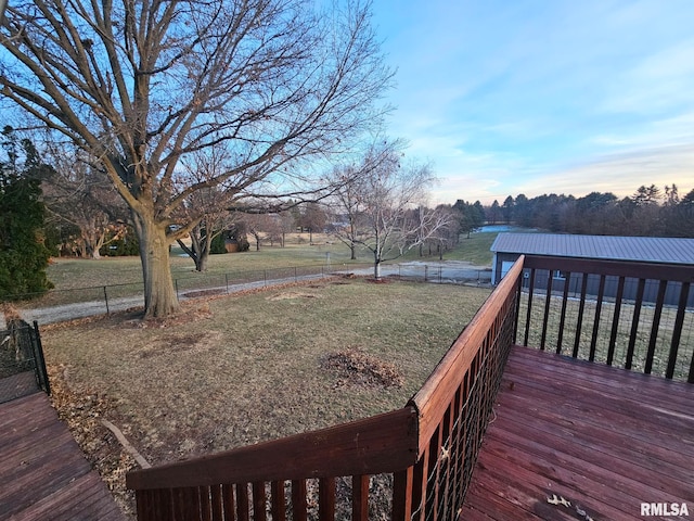 deck featuring a lawn