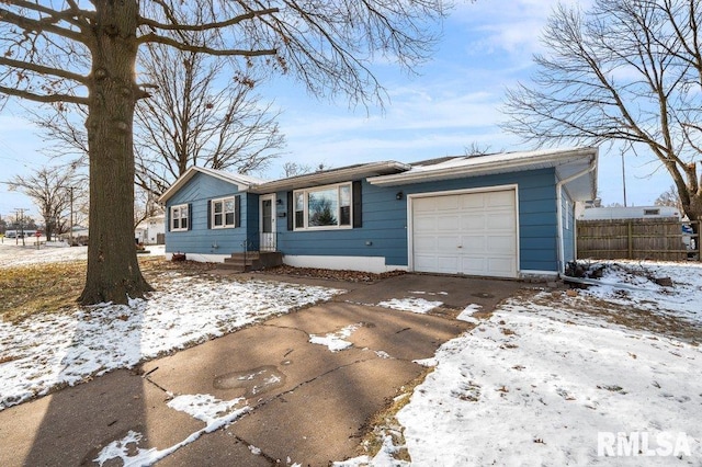 single story home featuring a garage