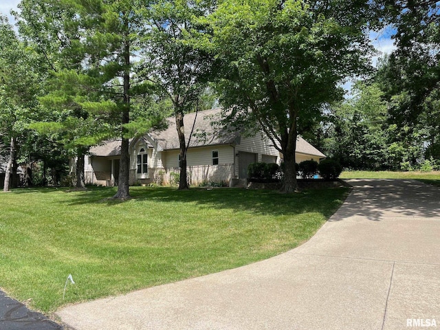 view of home's exterior with a lawn