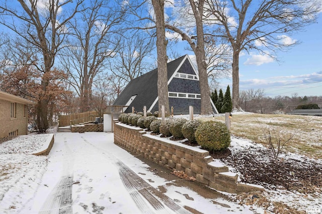 view of snow covered property