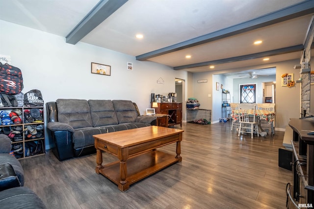 living room with beam ceiling, ceiling fan, and dark wood-type flooring