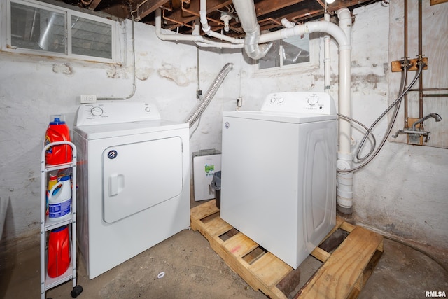 clothes washing area featuring washing machine and dryer