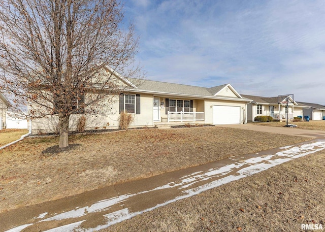 single story home featuring a porch and a garage