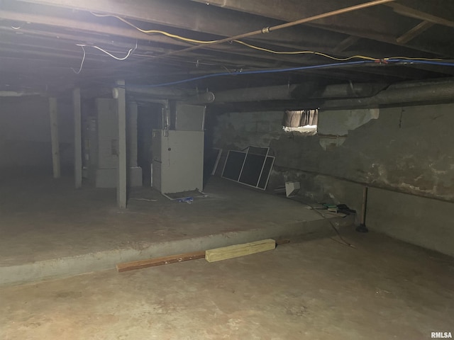 basement featuring heating unit