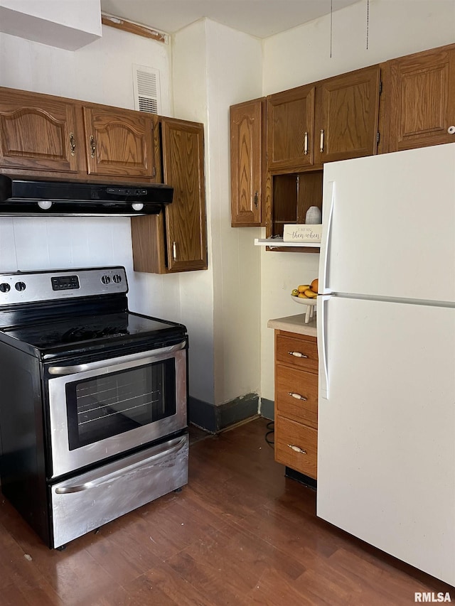 kitchen featuring stainless steel range with electric stovetop, dark hardwood / wood-style flooring, white fridge, and range hood