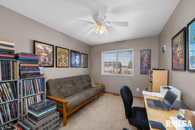 office featuring carpet flooring and ceiling fan