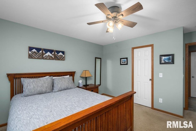 bedroom featuring ceiling fan and light colored carpet