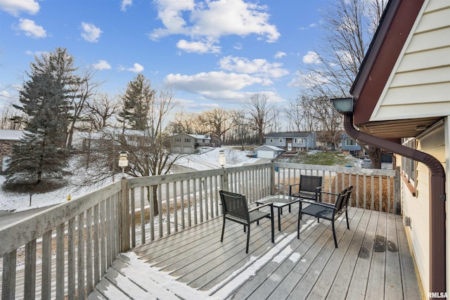 view of snow covered deck