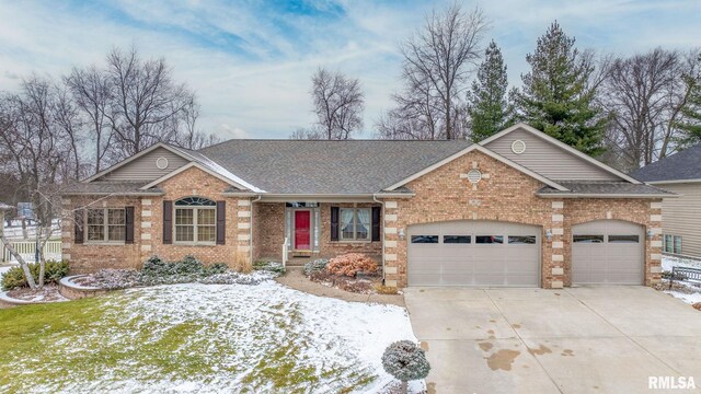 ranch-style home with a garage