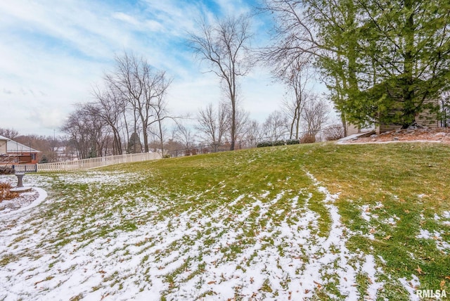 view of yard covered in snow