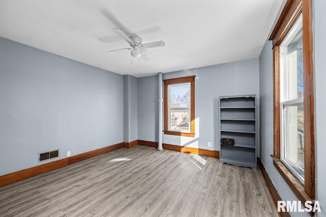 unfurnished bedroom featuring light hardwood / wood-style floors and ceiling fan