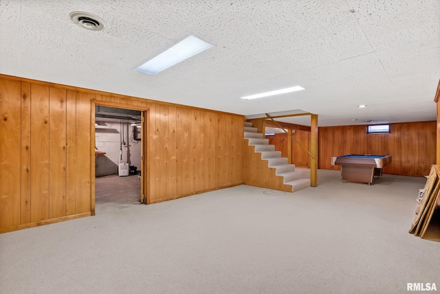 basement featuring light colored carpet and pool table