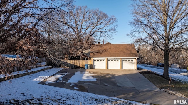 exterior space featuring a garage