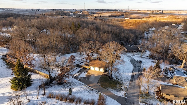 snowy aerial view with a rural view