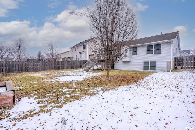 view of yard covered in snow