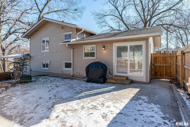 rear view of house with a patio area