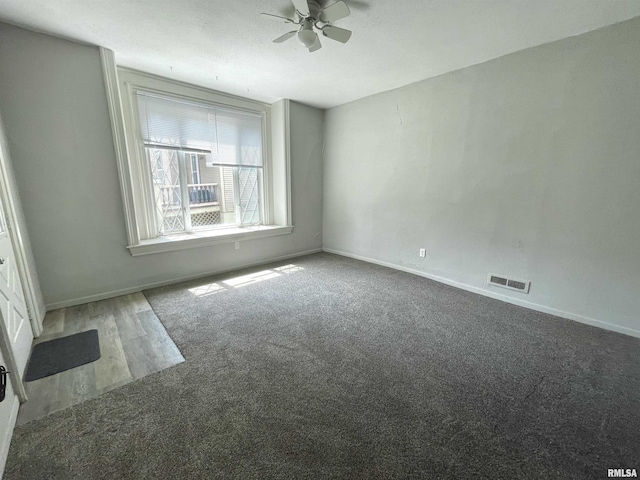 unfurnished room featuring ceiling fan