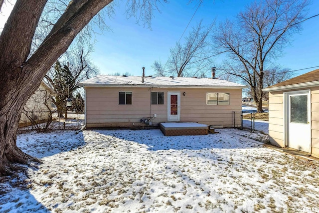 view of snow covered property