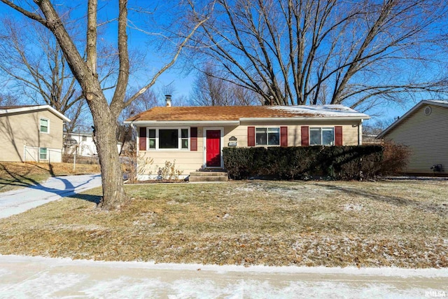 ranch-style house with a yard