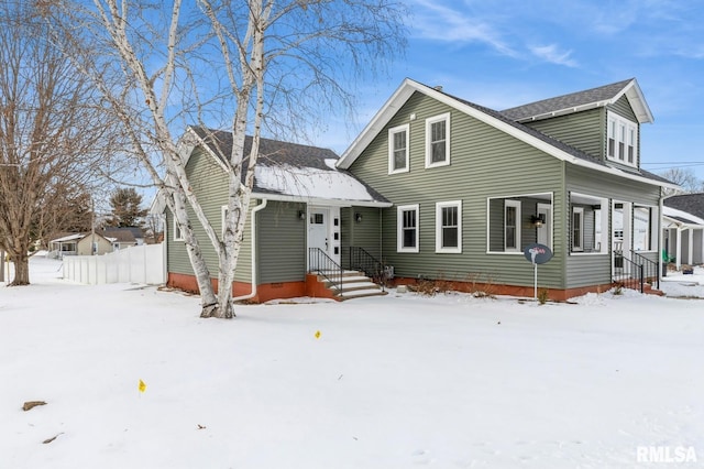 view of front of property with crawl space and a shingled roof