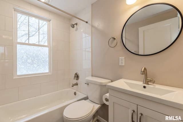 full bathroom featuring  shower combination, vanity, and toilet