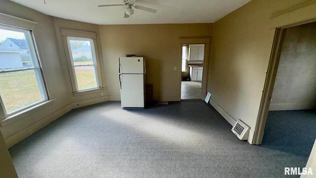 unfurnished room with ceiling fan